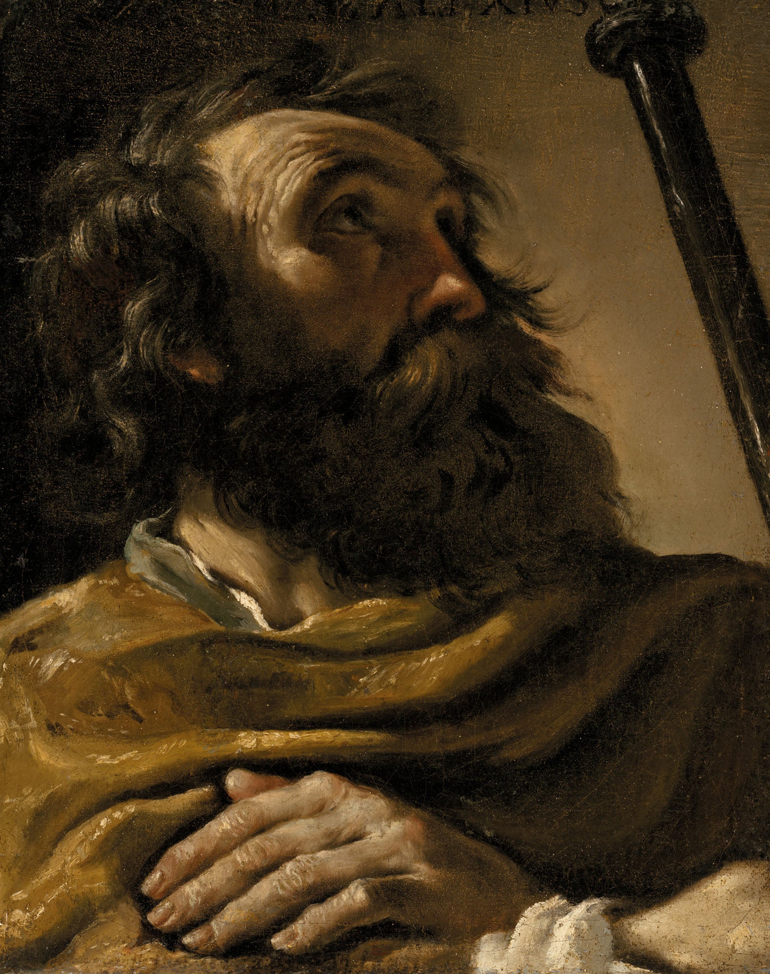 Saint Alexis dans un manteau marron, tenant un bâton - Guercino