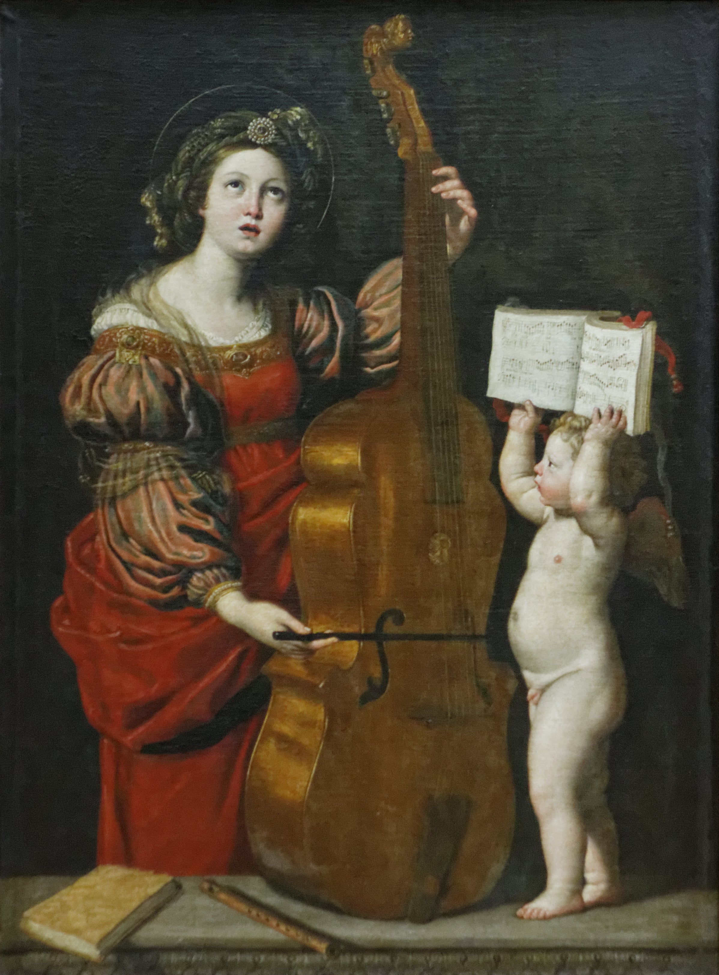 Sainte Cécile avec un ange locataire une partition musicale - Domenichino