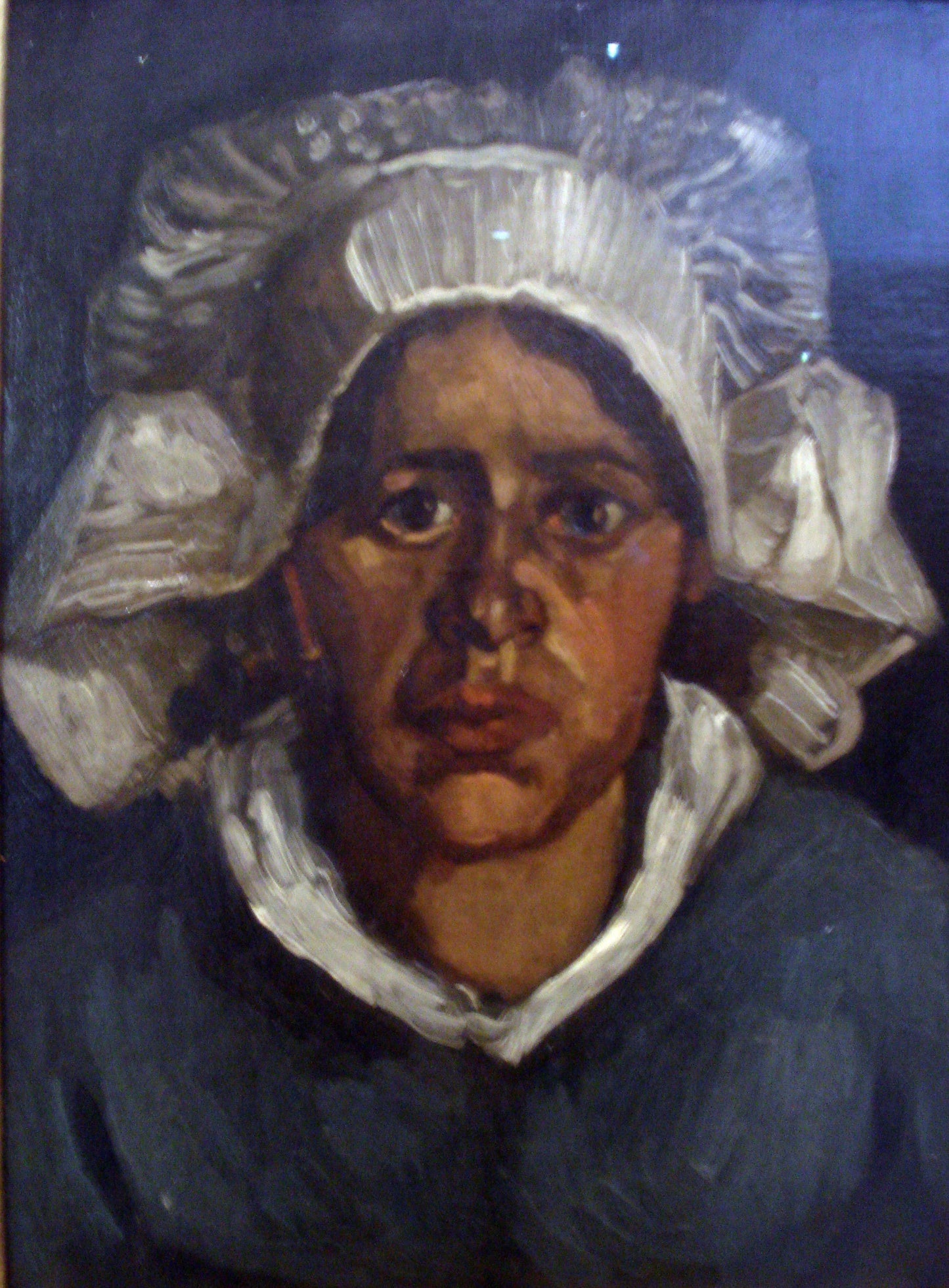 Reproduction du tableau « Tête de paysanne au bonnet blanc - Vincent van Gogh » par Alpha Reproduction en peinture à l’huile
