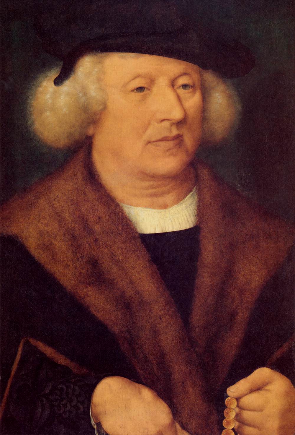 portrait d'un homme avec une casquette noire - Joos van Cleve