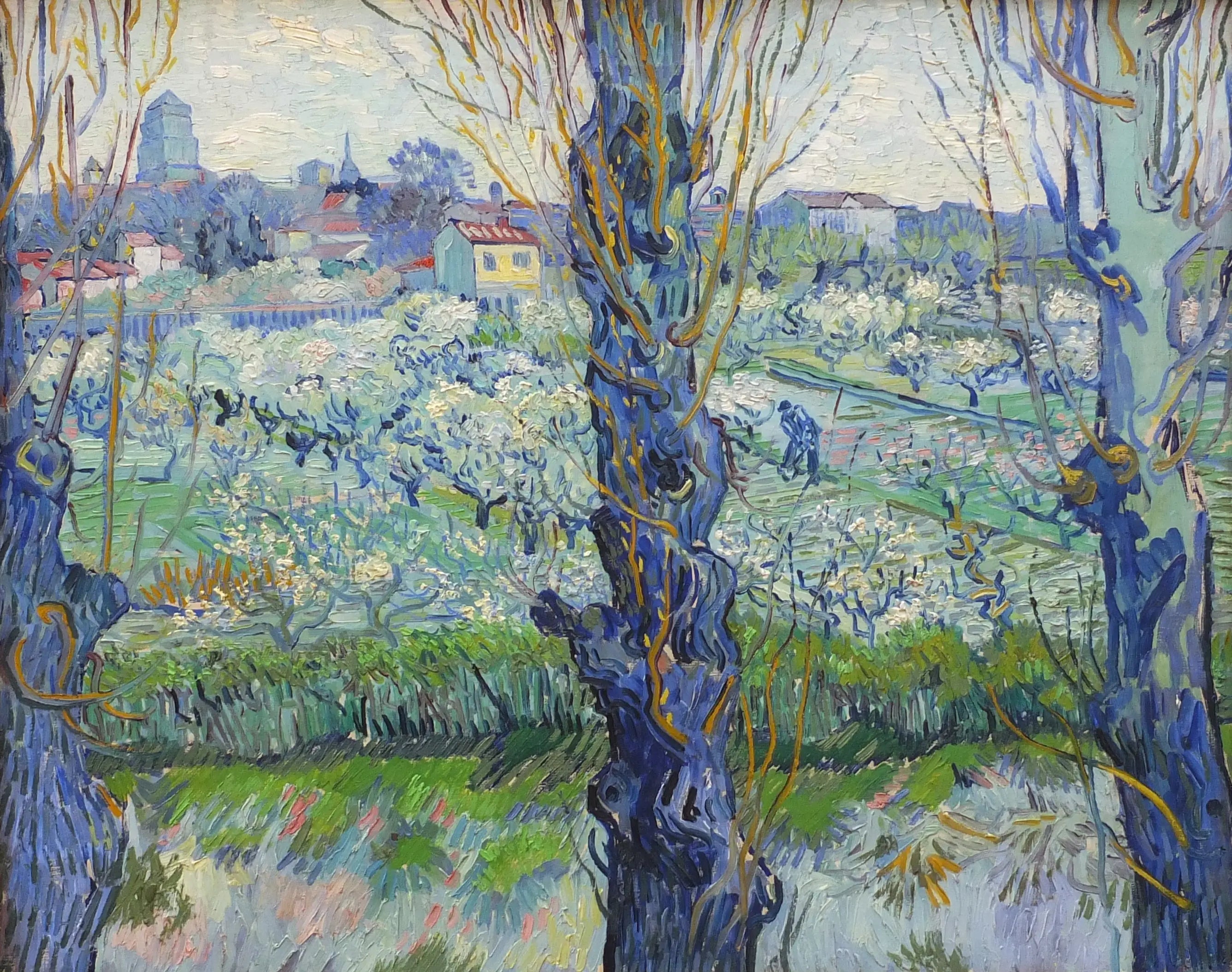 Reproduction du tableau « Verger en fleur avec vue d'Arles - Vincent van Gogh » par Alpha Reproduction en peinture à l’huile