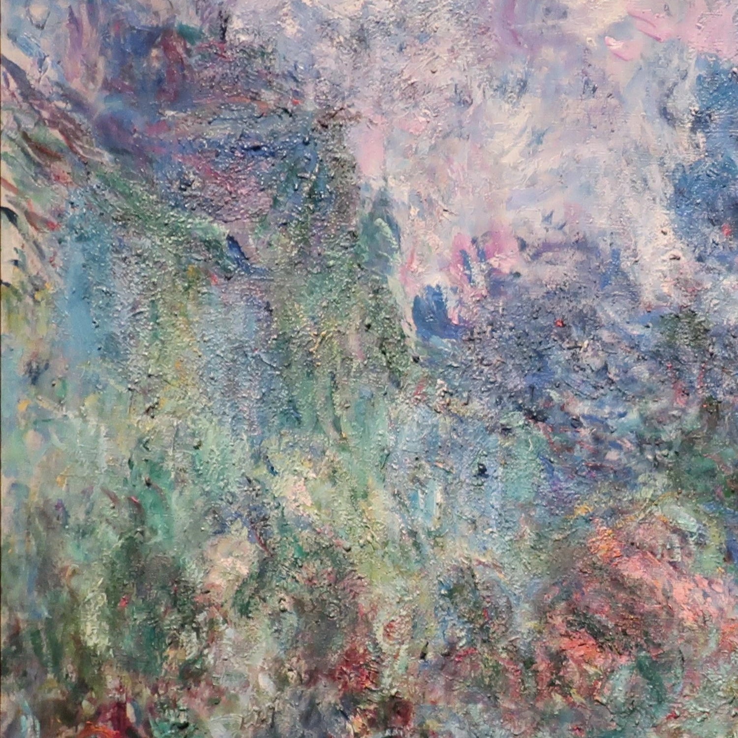 Détail de la maison bleue et de l’allée dans le jardin tardif de Monet