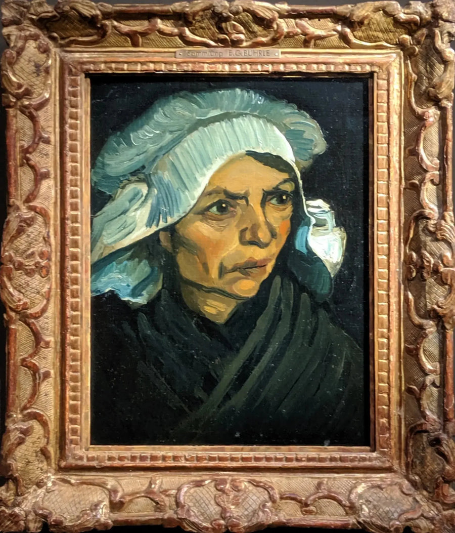 ראש של איכרה עם כובע לבן - Vincent van Gogh